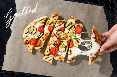 grilled pizza with tomatoes and zucchini
