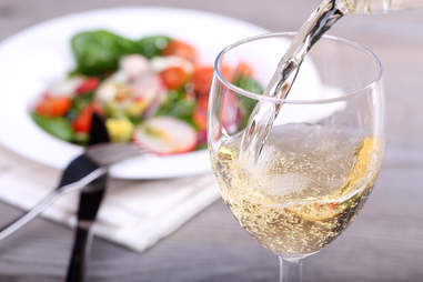 white wine poured into glass
