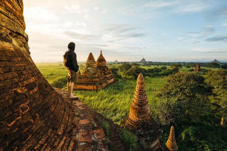 person standing on Bagan Pagoda during sunrise