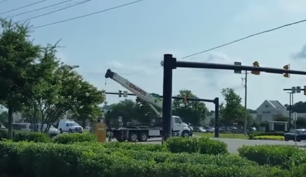 Truck Demolishes Stoplight and Power Lines With Raised Crane (Video ...