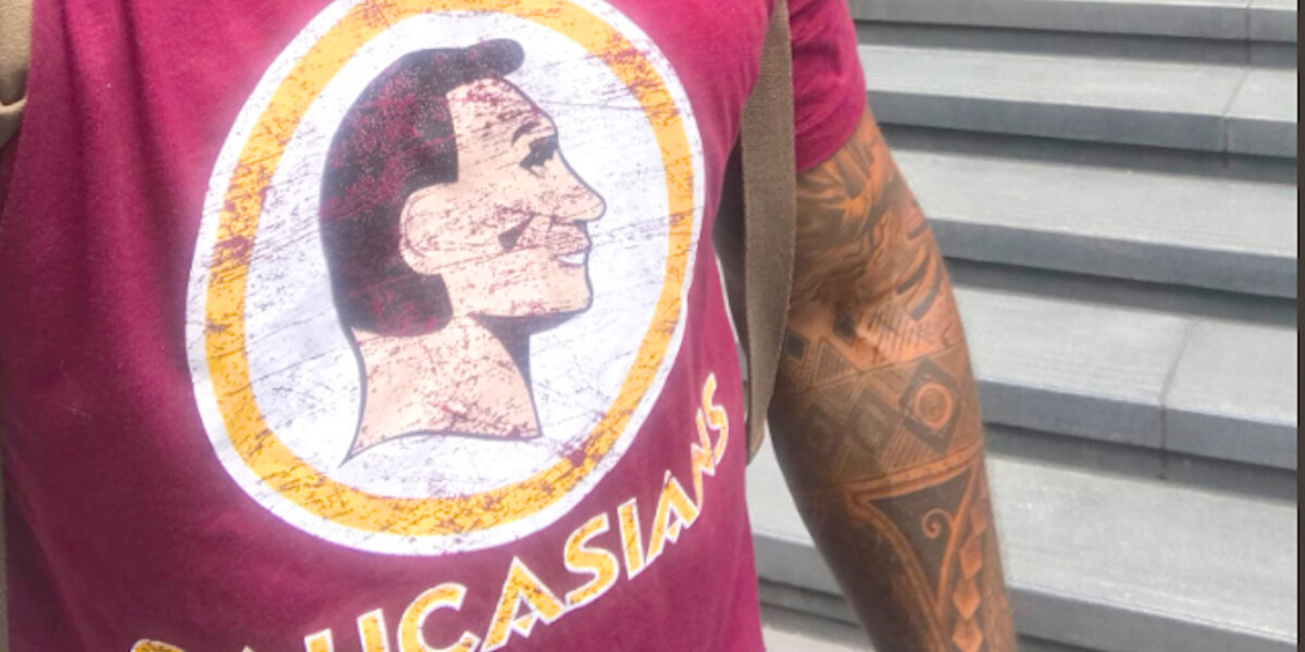 Man Walks Around NYC With 'Caucasians' Shirt To Parody Redskins Logo  This  guy walked around NYC wearing a shirt that says 'Caucasians,' as a parody  of the offensive Redskins logo —