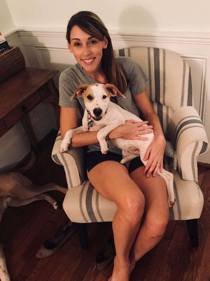 Ali Standish with her foster puppy, Floyd