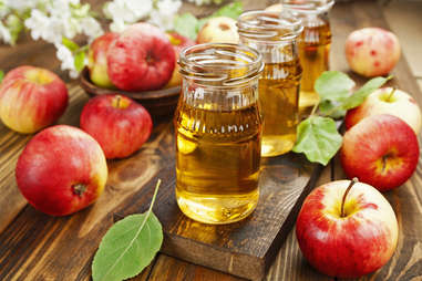 apple juice on the table  with apples