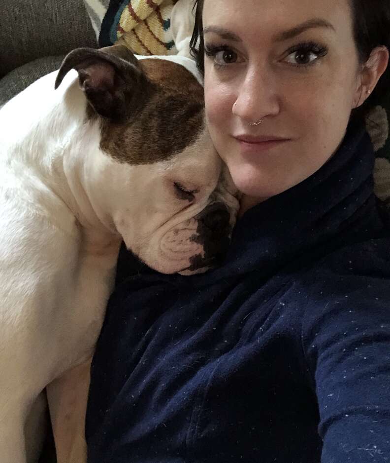 Emily Taphouse holds her English bulldog, Juno