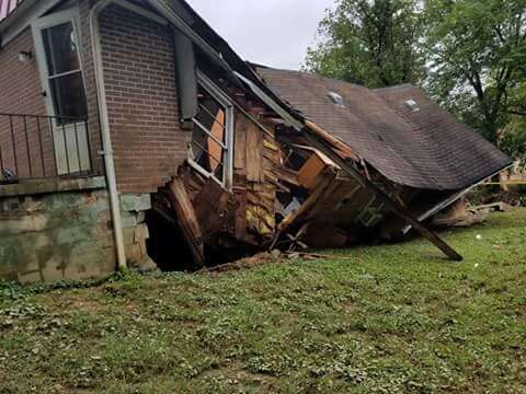 Collapsed house due to flash flooding