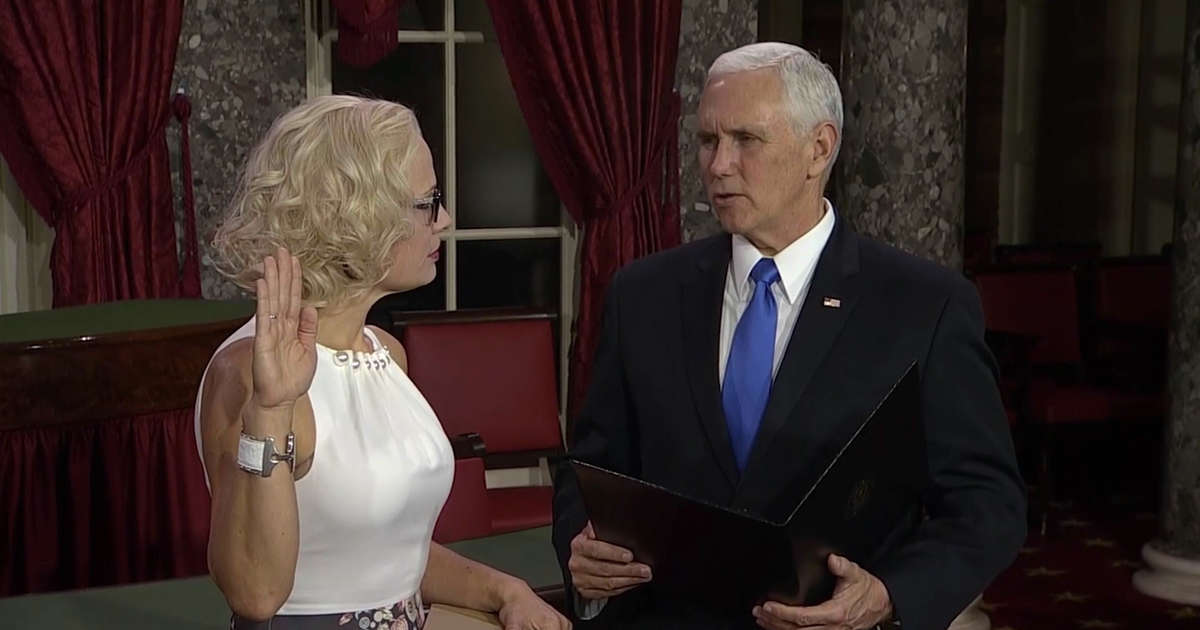 Mike Pence Swears in Kyrsten Sinema on Constitution - NowThis