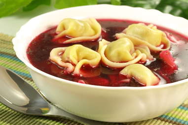Red borscht with uszka in a bowl