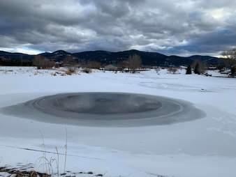 Lost dog trapped on icy pond in Bozeman, Montana