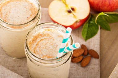 Apple Banana Cinnamon Smoothie in small jar with straw