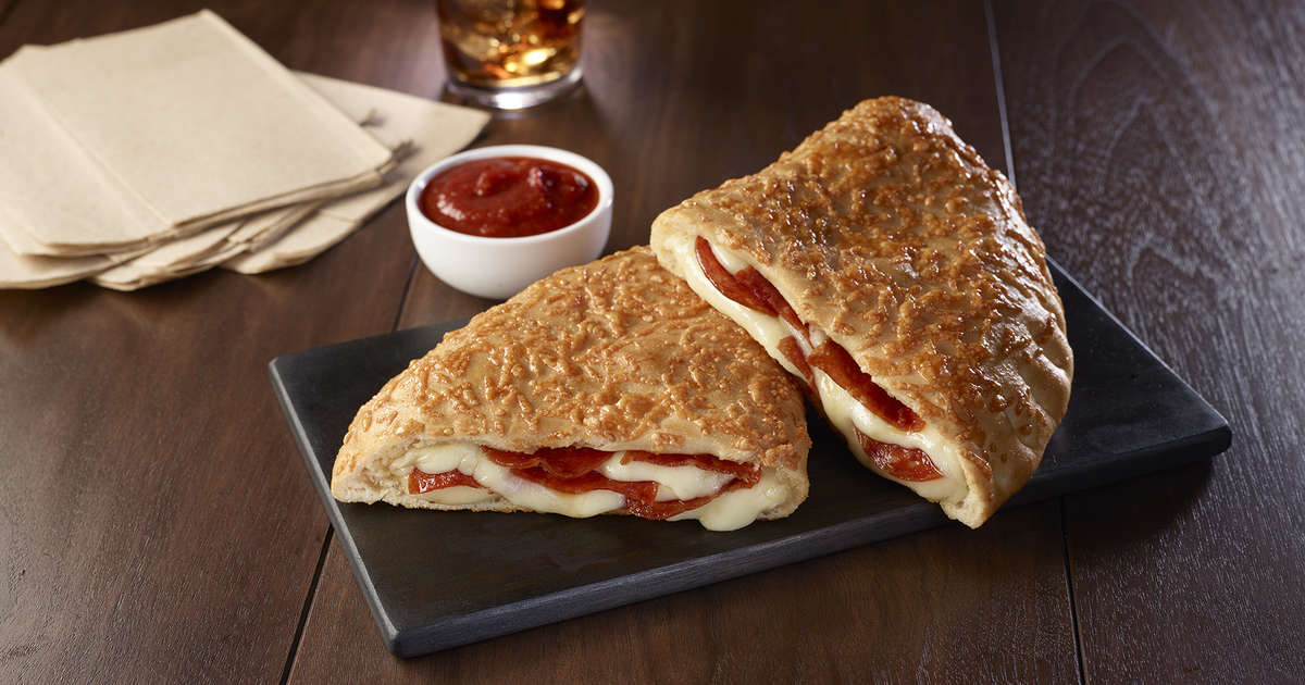 Pizza Hut P'Zone Calzones Are Back for March Madness Basketball Thrillist