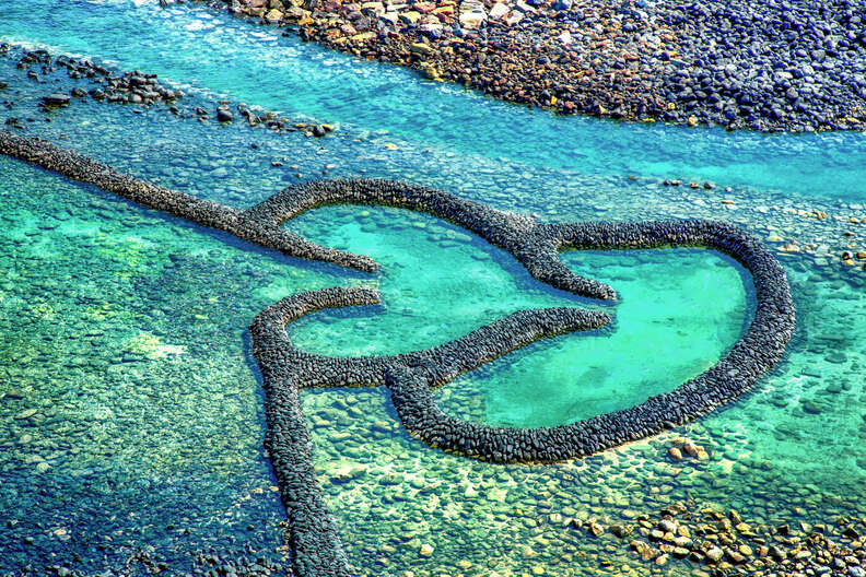 Twin-Hearts Stone Weir in Penghu Beach, Taiwan