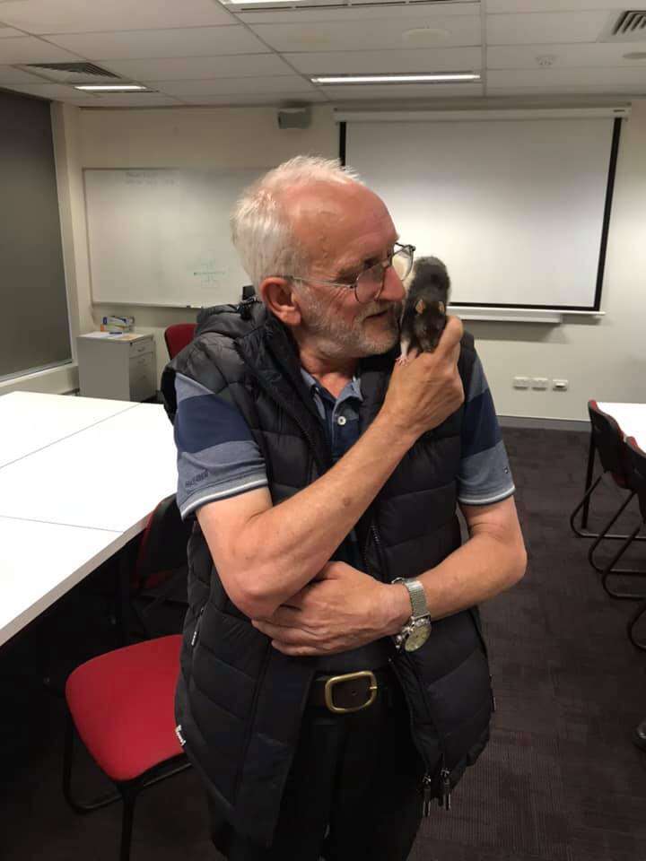 homeless man and his rat