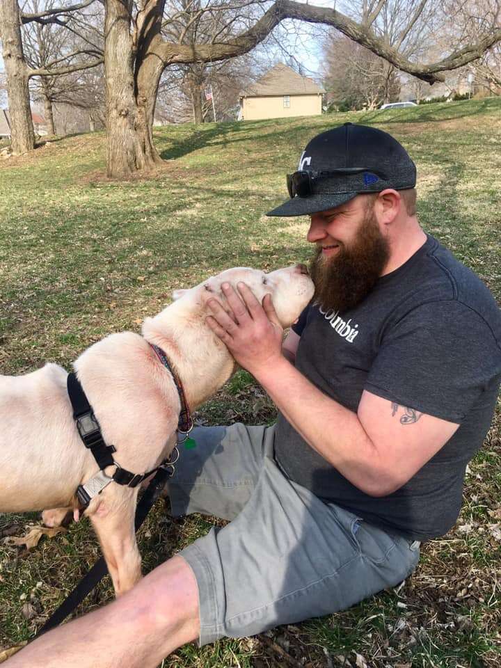 mailman rescues dog