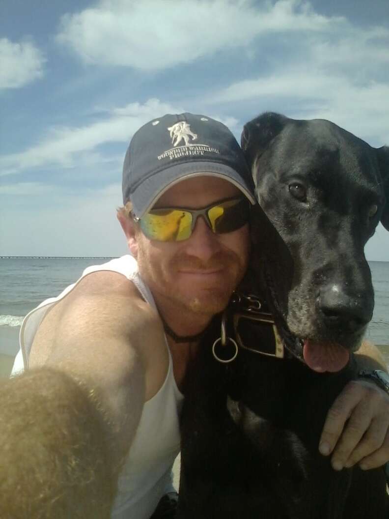Dog rescuer and his own great dane 