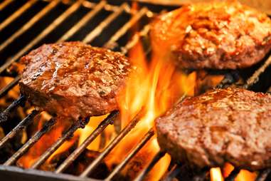 beef patties on grill