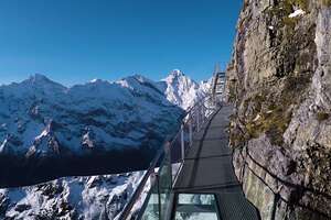 Hang off the Edge of the Swiss Alps 9,700 Feet in the Air