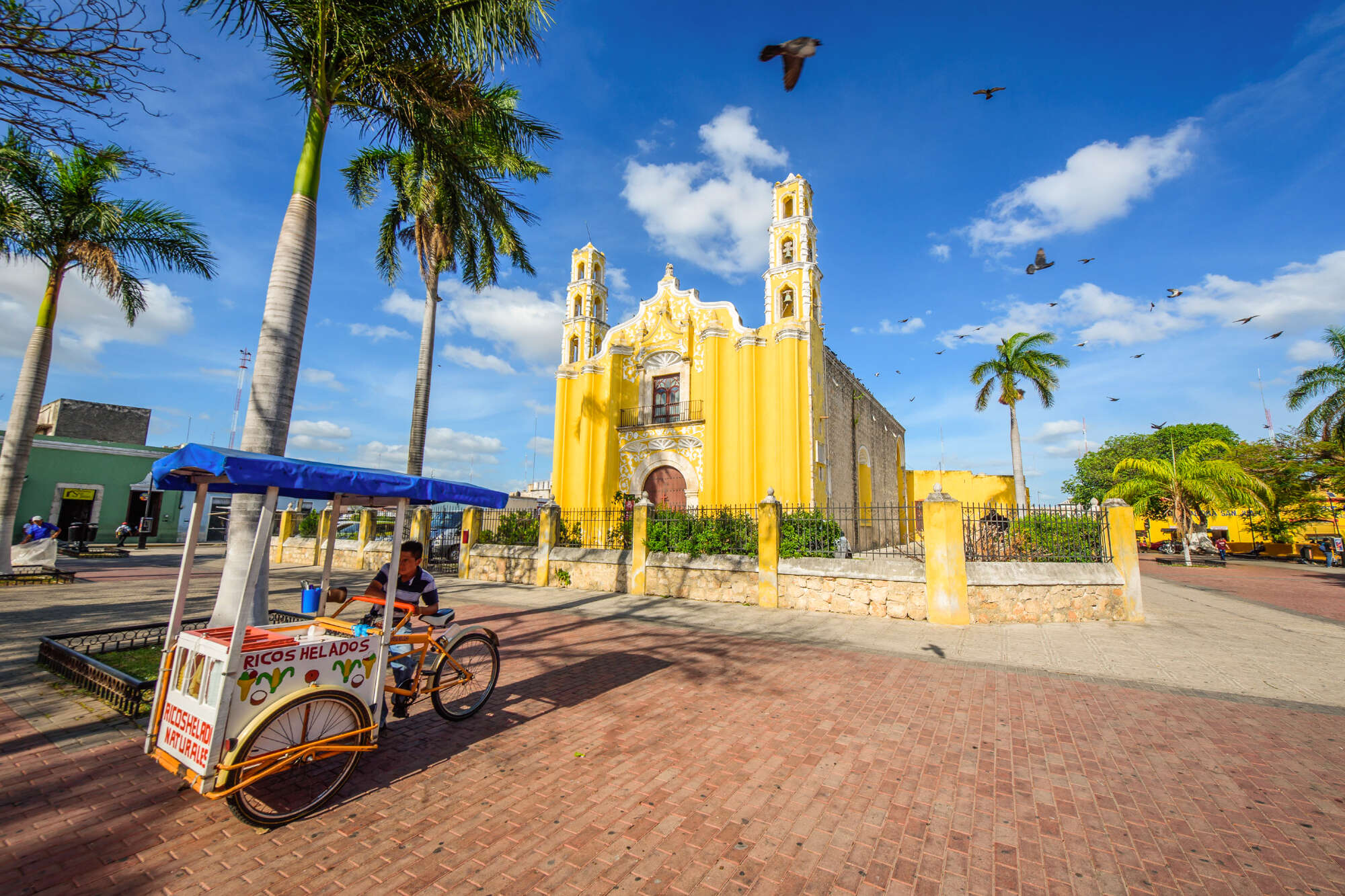 a colorful Mexican church on a sunny day