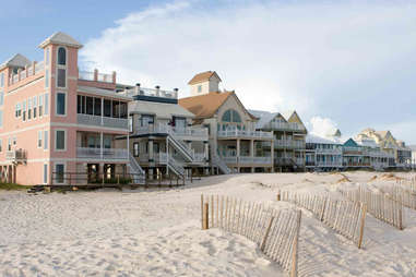 pastel-colored beach houses on the shore