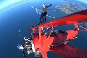 Are You Brave Enough to Walk Around on the Wings of a Biplane While It's Flying at 3,500 Feet?