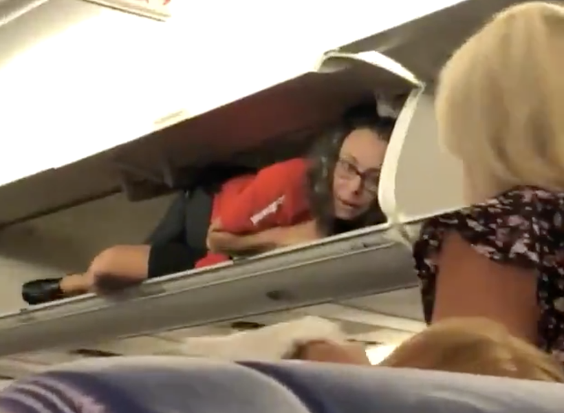 flight attendant overhead prank thrillist