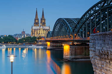 lighted Cologne Cathedral and Hohenzollern Bridge 