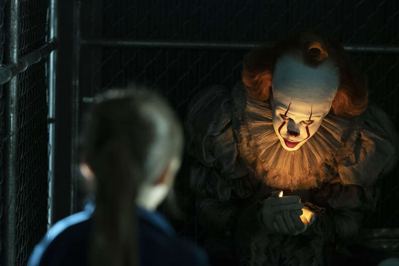 Pennywise the Clown gnaws on child's hand in new It clip