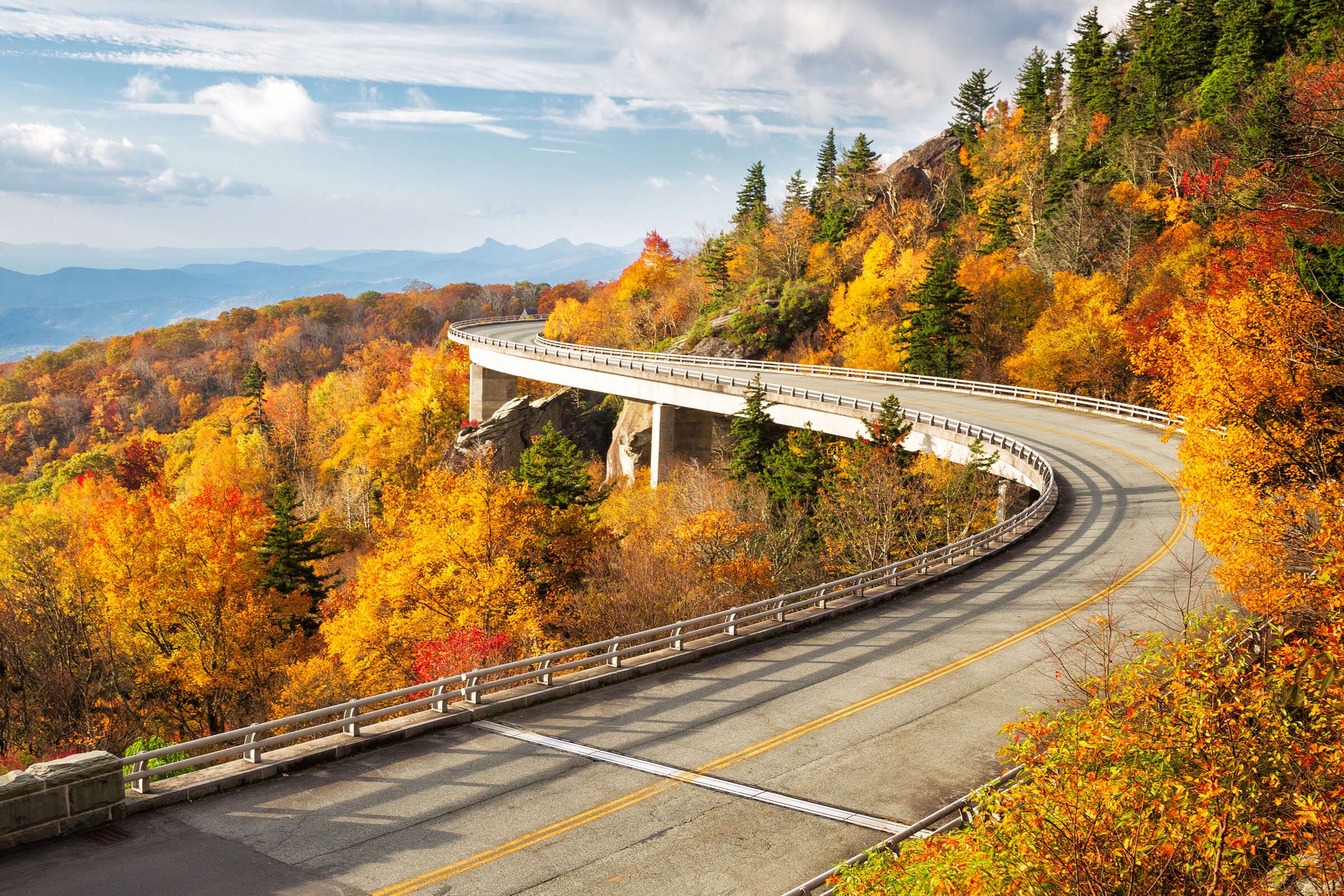 mountainside road surrounded by fall foliage