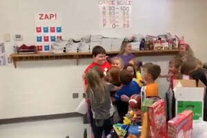 Elementary School Students Surprise Classmate with Toys After House Fire