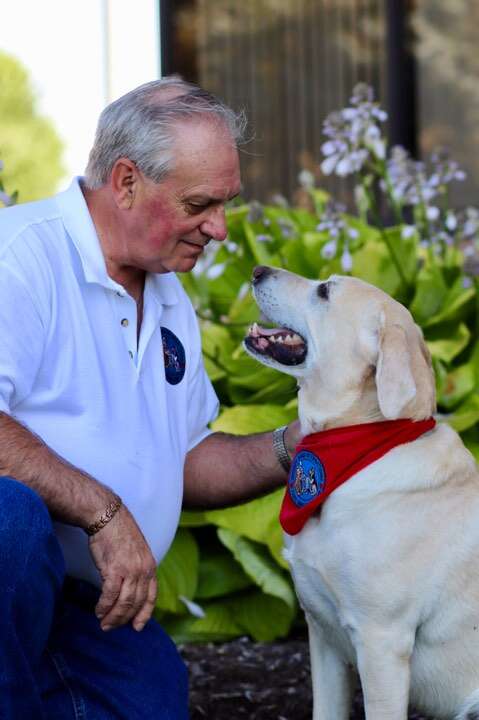 Benji the therapy dog and his dad