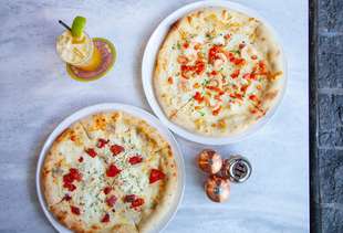 Eat Your Way Around the Island at These Oahu Pizza Shops