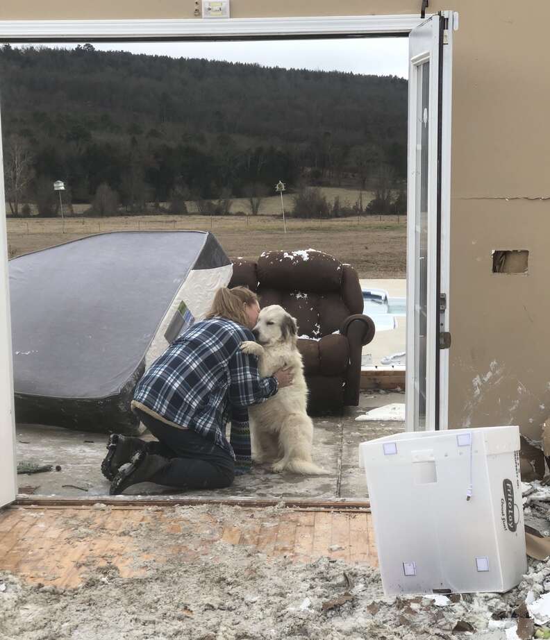 Woman finds dog after tornado destroys home