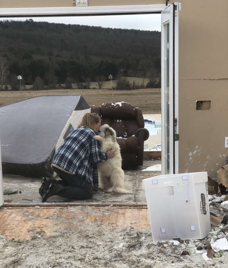 Woman reunites with dog after tornado in Arkansas