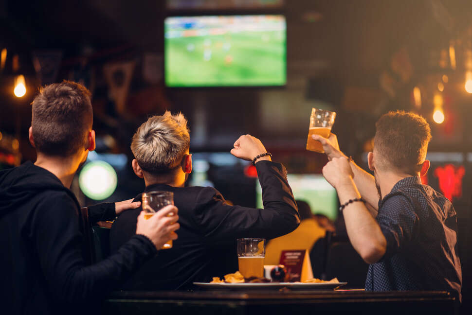 men watching football at a sports bar