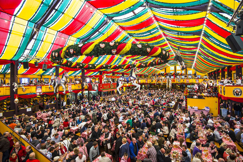 crowds inside a beer tent at Oktoberfest