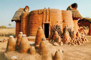 mud hut with woodoo altar