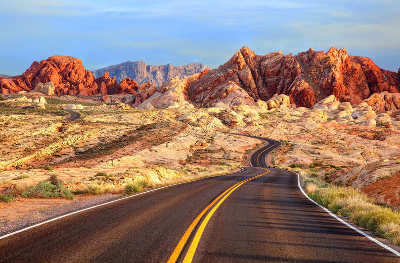 winding road through colorful rock formations