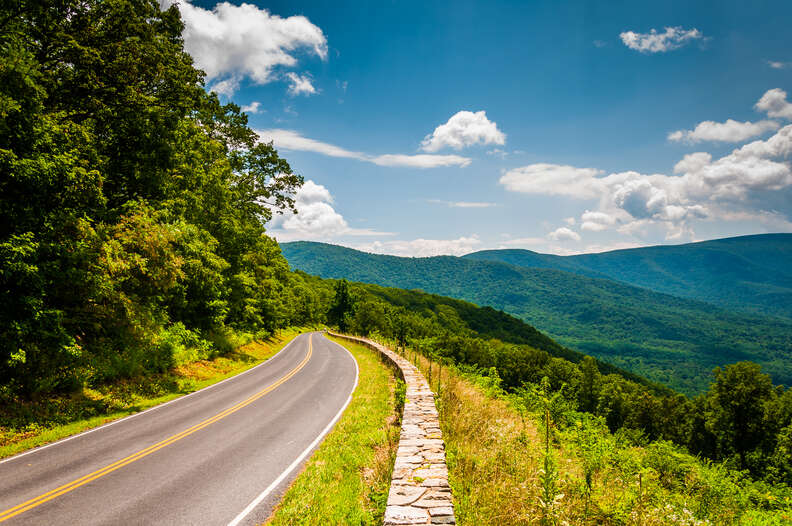 road leading around the side of a mountain