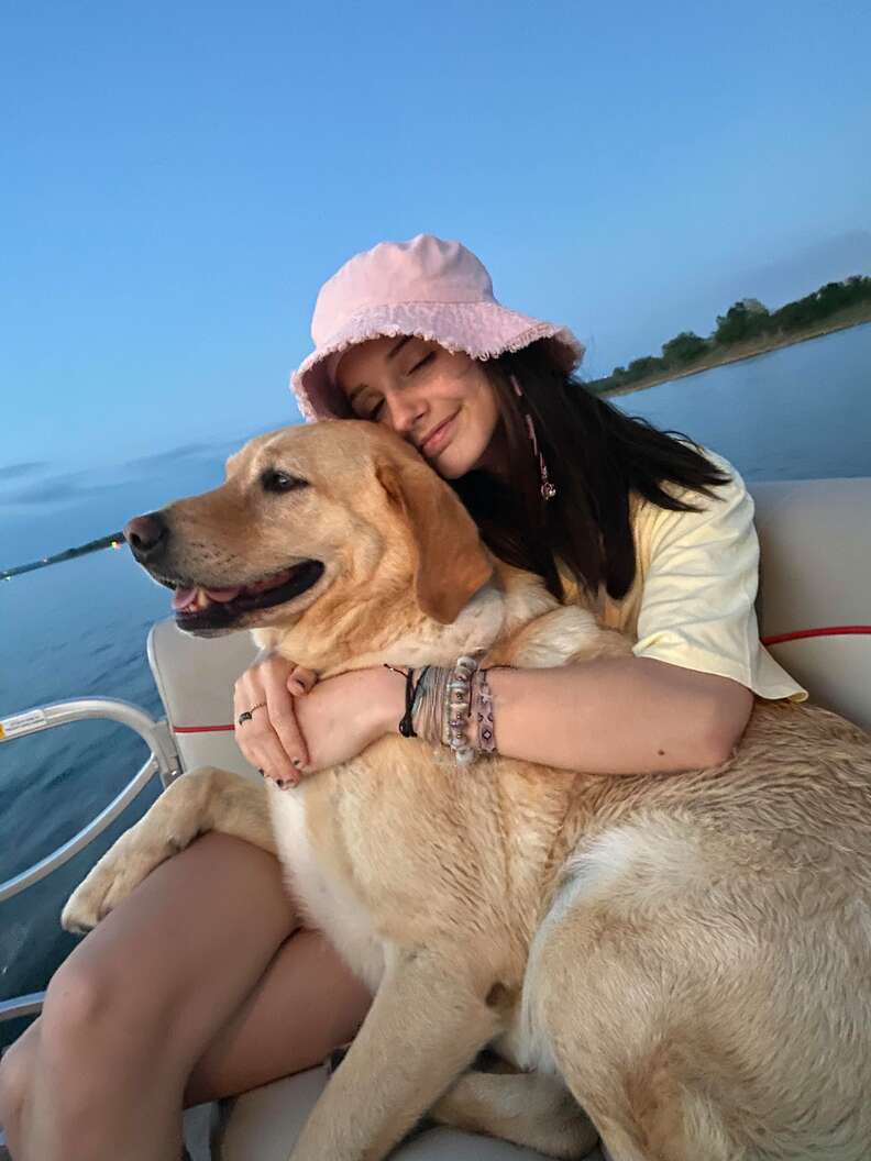 dog swims to boat