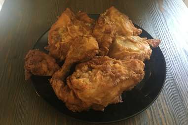 Eight pieces of KFC fried chicken on a plate