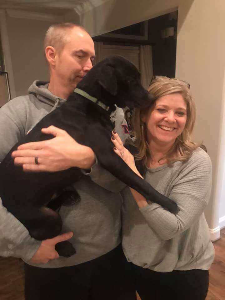 Wrinkles the rescue dog with his forever family