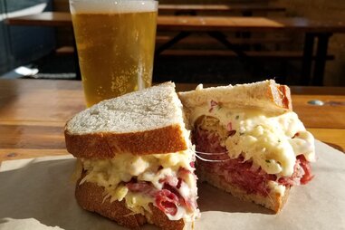 Ploughman’s Deli & Cafe sandwich and beer