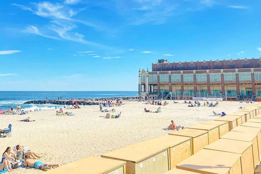 Cute People On The Beach - Best Beach Towns in the US From the East Coast to the West Coast - Thrillist