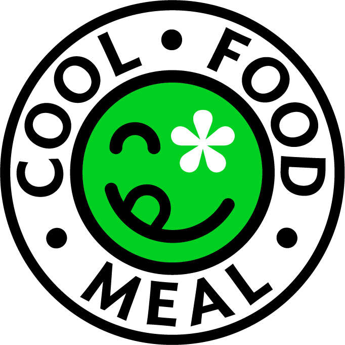 A green, winking smiley-face is Panera's eco-friendly food badge.