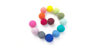 set of hand-felted wool balls for cats