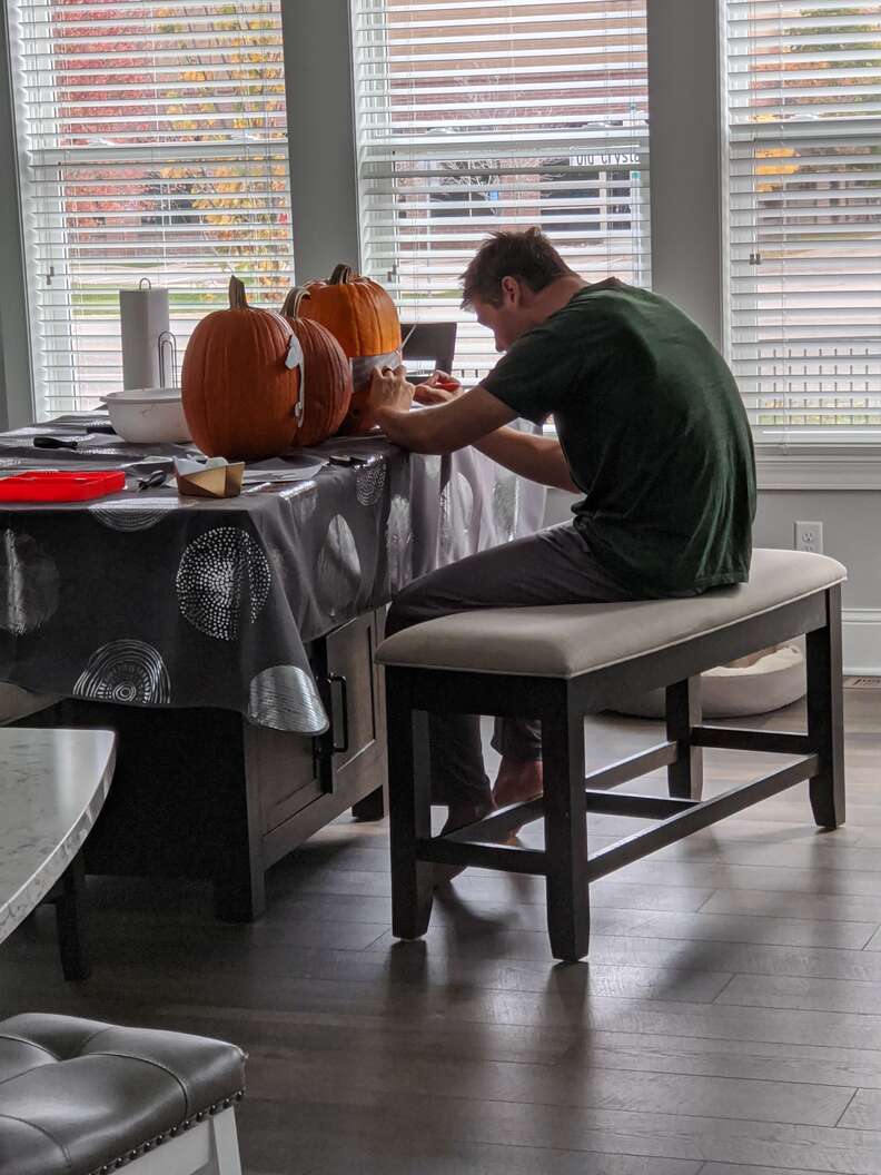guy carves pumpkins to look like dog