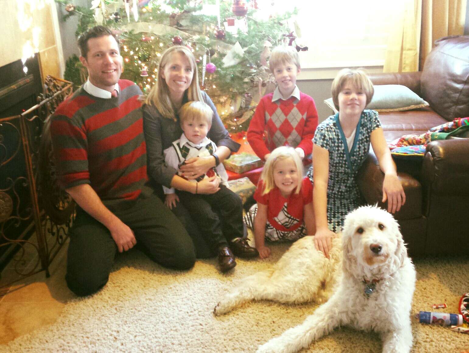 dog and family at Christmas 