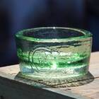 A one-of-a-kind dog bowl made from recycled glass