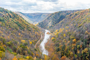 river leading through mountains