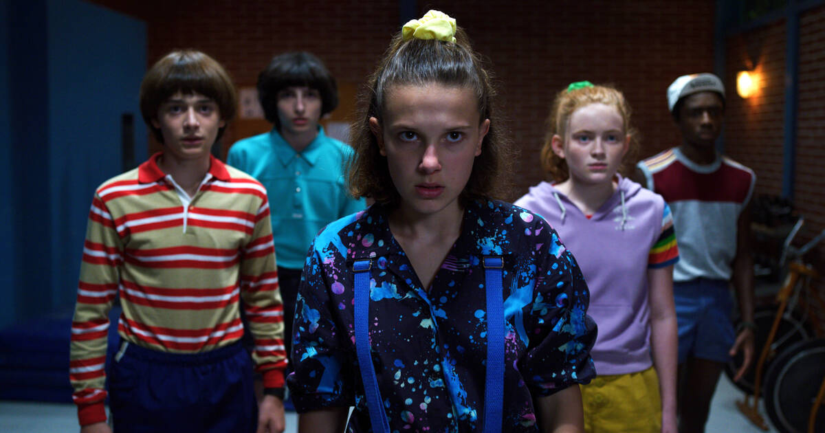 The blue-collared top worn by Eleven (Millie Bobby Brown) in the series Stranger  Things (Season 4 Episode 9)
