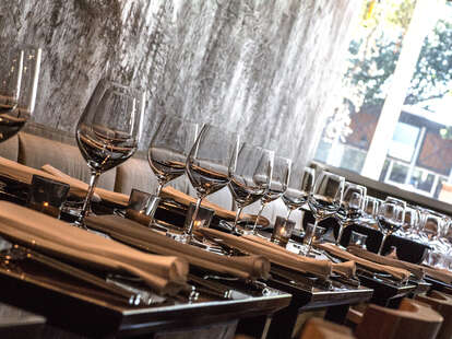Wine glasses and napkins on tables inside FT33